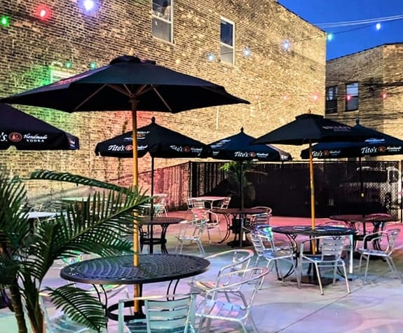 Chicago patio venue at iO arranged with outdoor tables to host private events, fundraisers, and galas